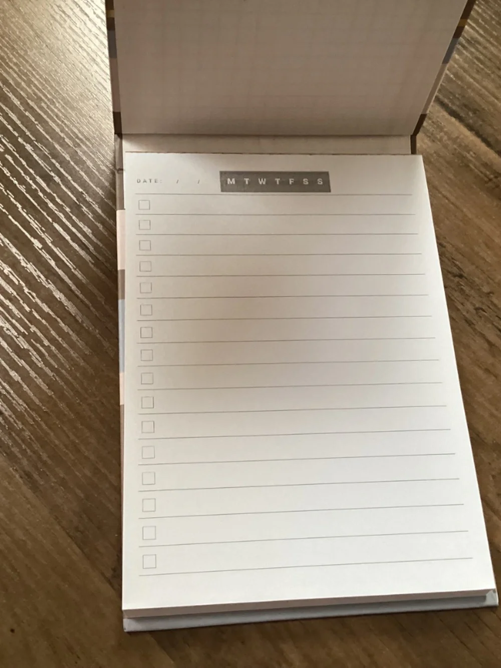 Caliber Hardcover task notebook with a striped pattern New